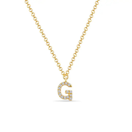 Letter "G" in 14 karat yellow gold and diamonds 